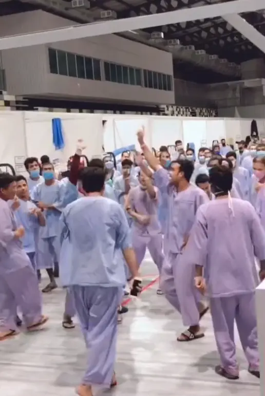 Group of covid-19 patients dancing at the quarantine center.